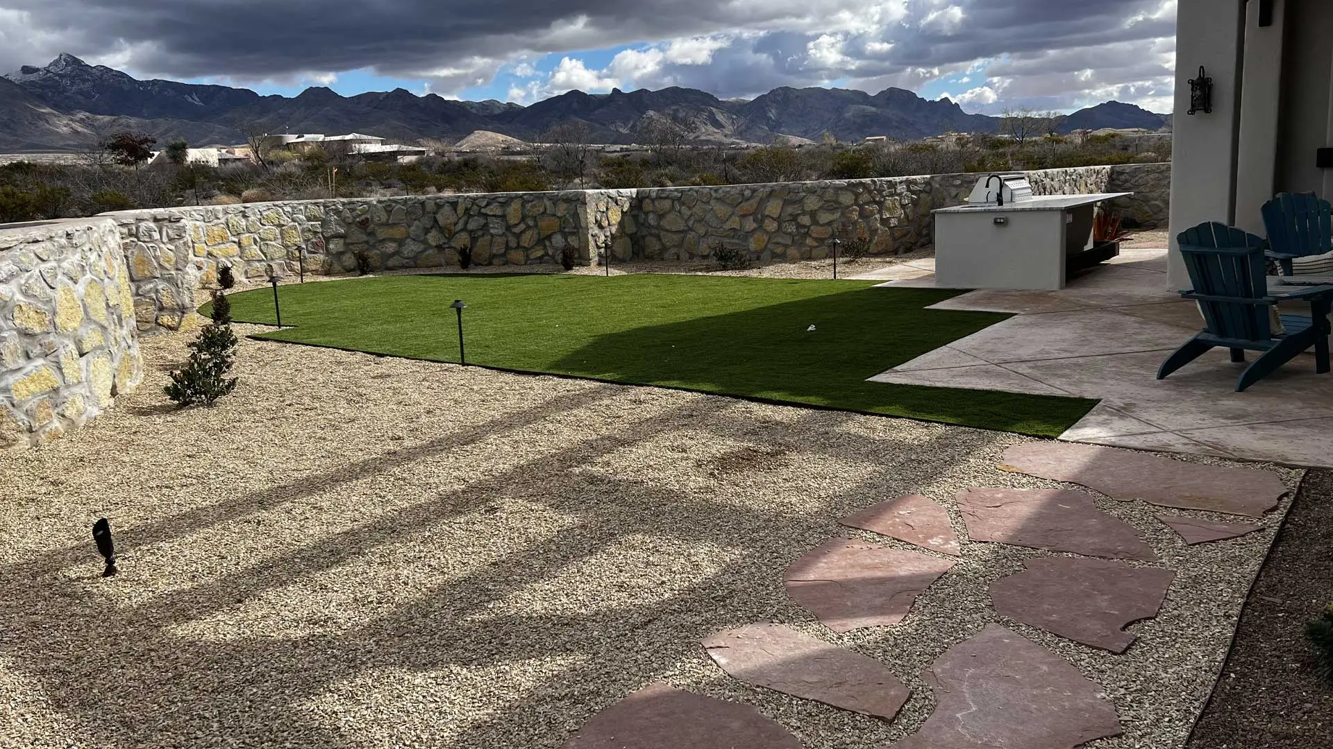 Rock retaining wall installed for a property with a mountain view in Las Cruces, NM.