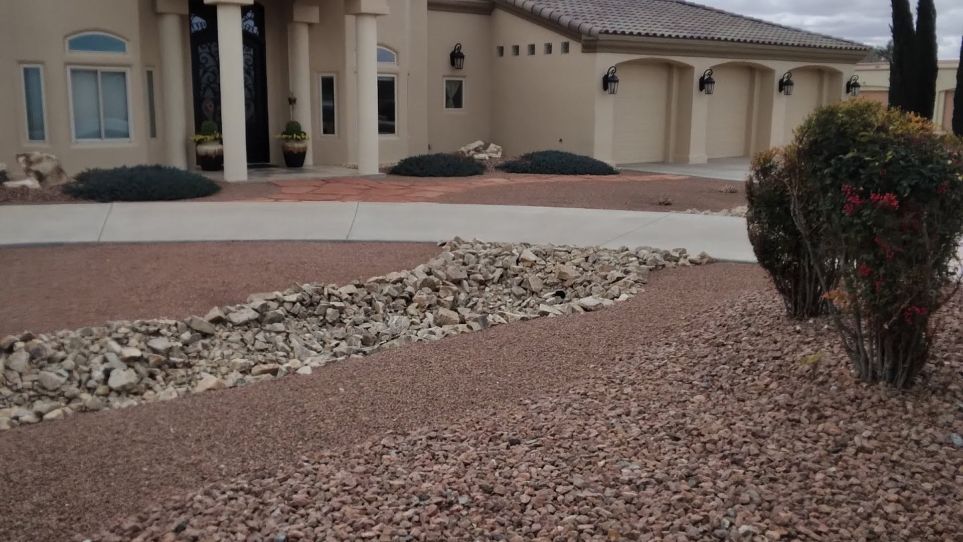 Rock filled landscaping for a property in Las Cruces, TX.