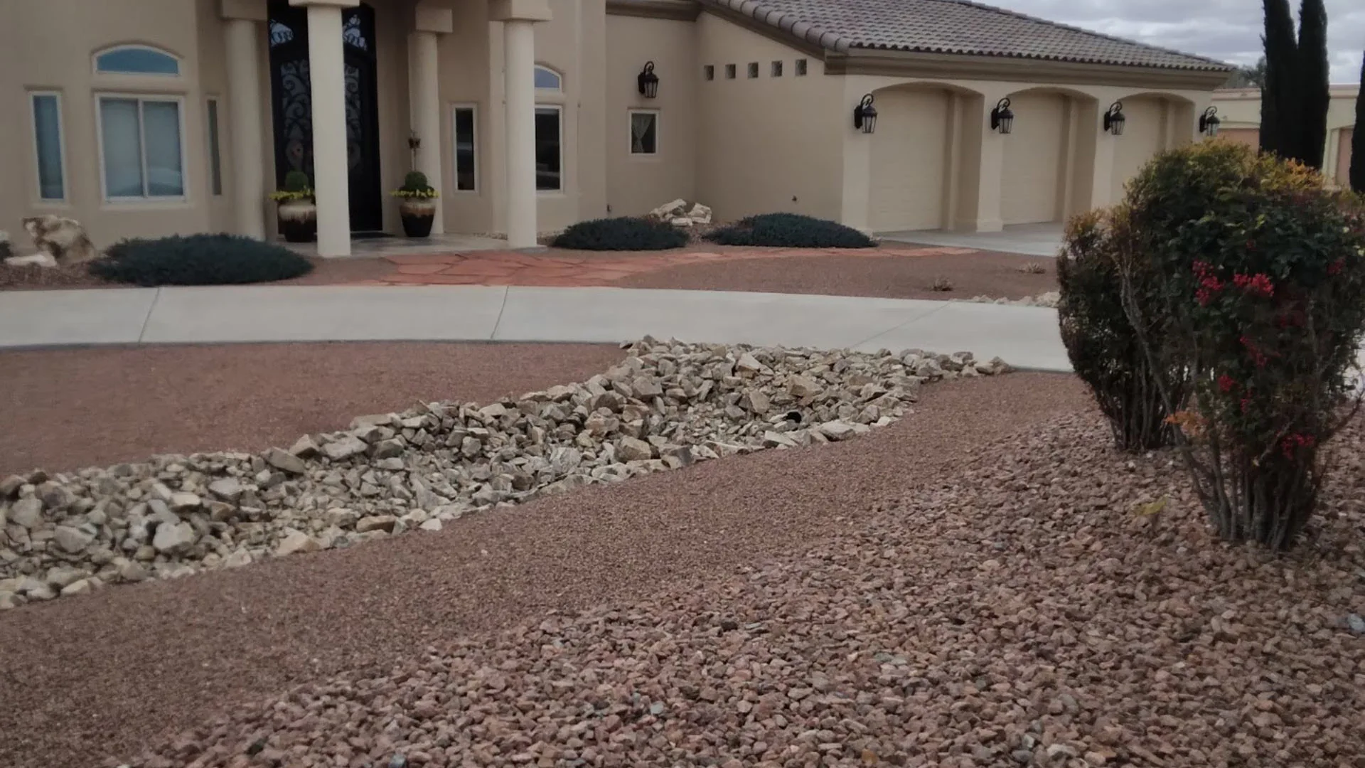 Rock filled landscaping for a property in Las Cruces, TX.