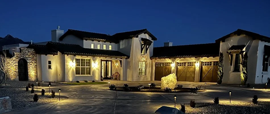 House in Las Cruces, NM, with landscape lighting using LED lights.