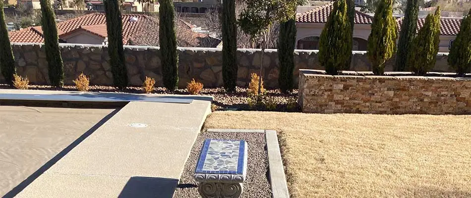 New retaining wall, landscaping, and rock installation at a residential property in El Paso, TX.