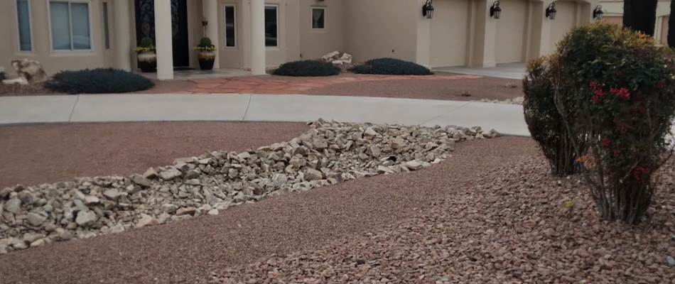 Rocks installed throughout landscape in Mesilla, NM.